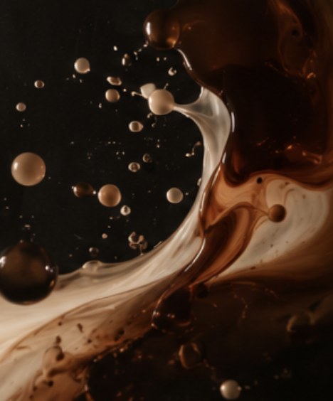 Coffee and milk splashing together